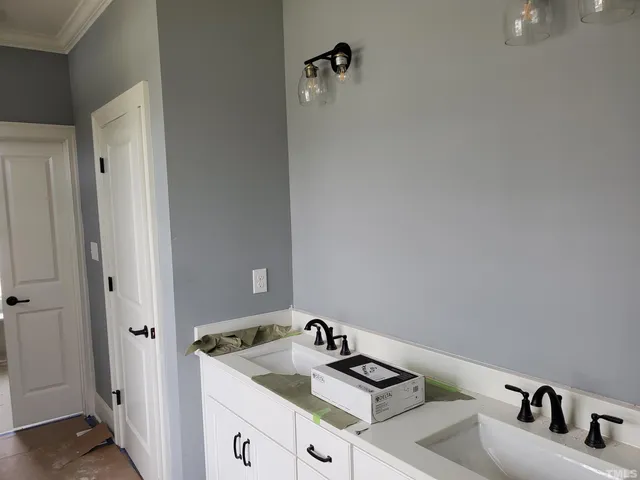 a house with a black gate