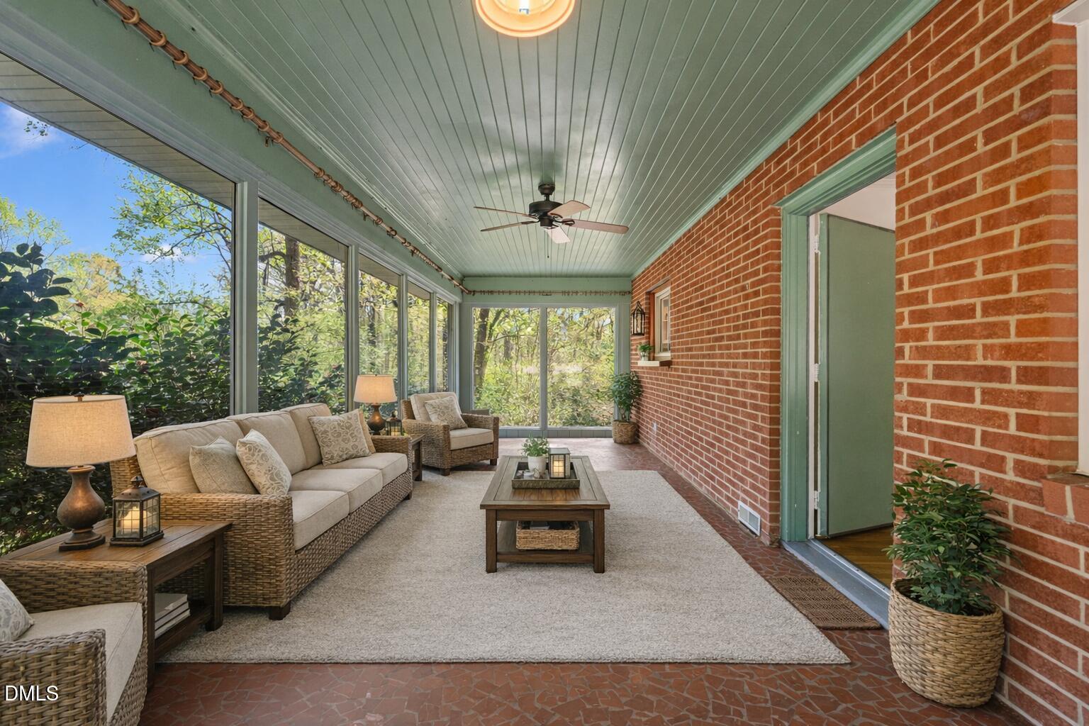 3525 Hope Valley Road Durham, NC 27707 - Photo 4 of 38 Serene sunroom with lush forest view