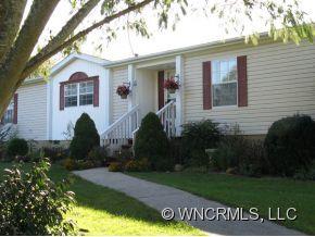 1197 Beaverdam Road Canton, NC 28716 - Photo 14 of 14 a view of a white house with a yard