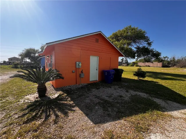 a backyard of a house with lots of green space