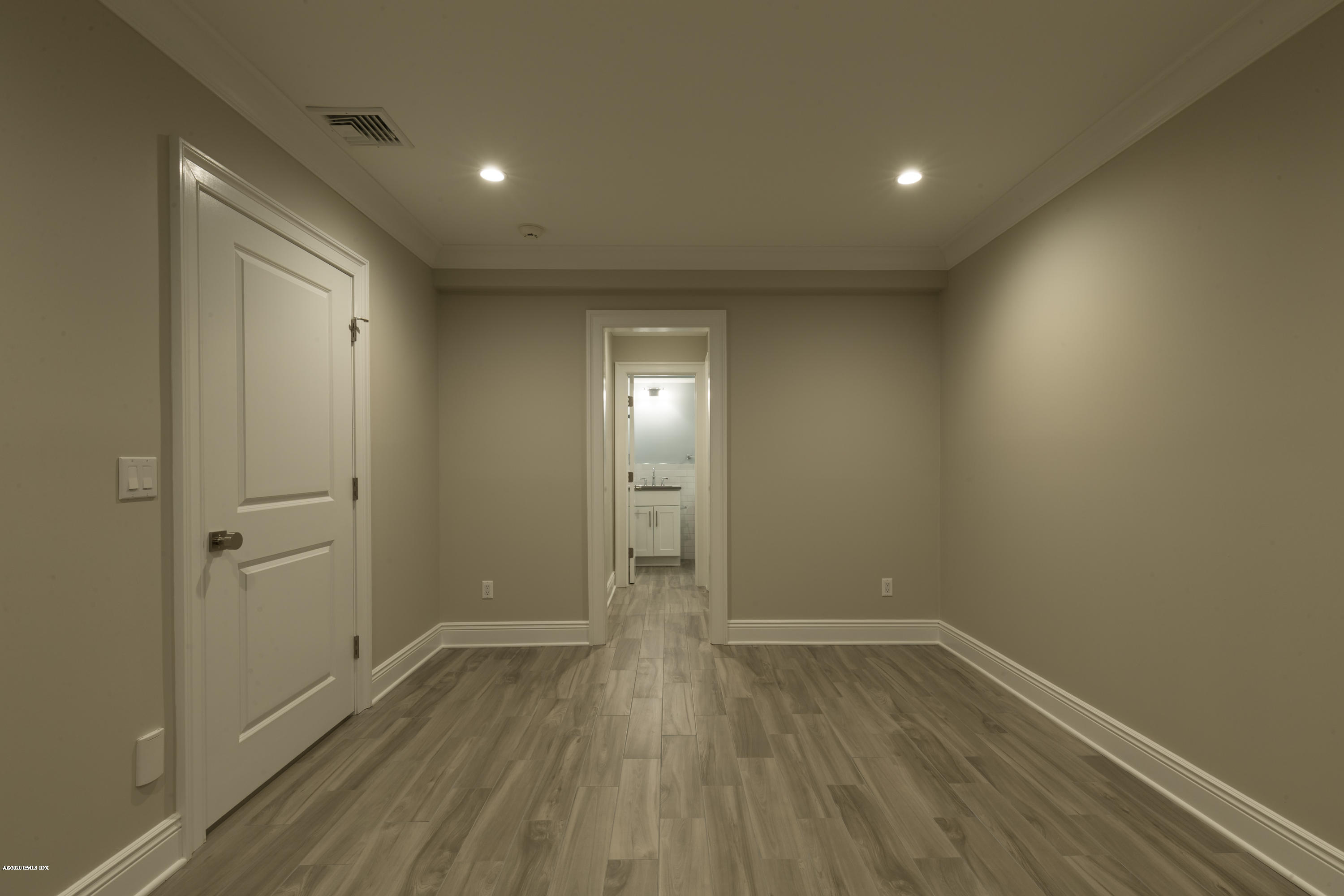 301 Davis Avenue, Unit B Greenwich, CT 06830 - Photo 15 of 16 wooden floor in an empty room with wooden floor