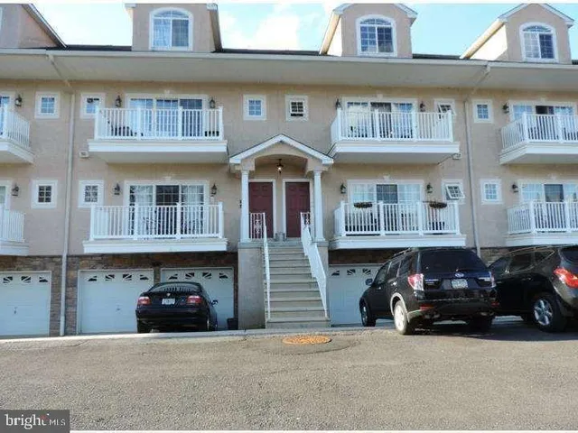 a car parked in front of a building