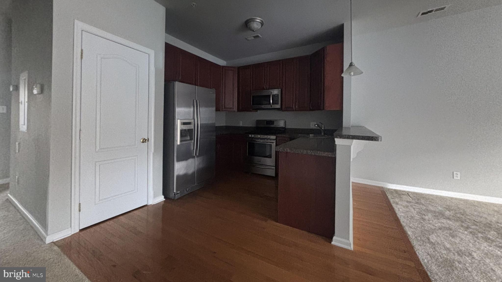 290 Byberry Road Philadelphia, PA 19116 - Photo 2 of 12 a kitchen with stainless steel appliances granite countertop a refrigerator and a stove