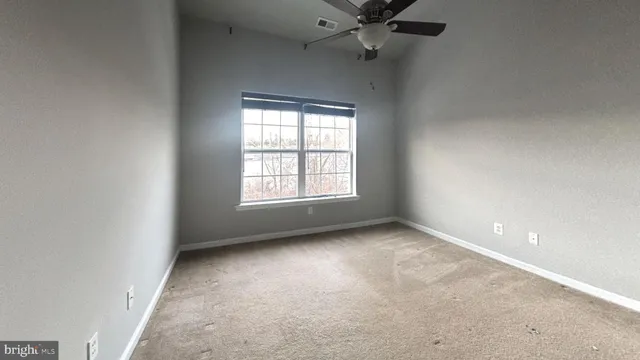 an empty room with a window