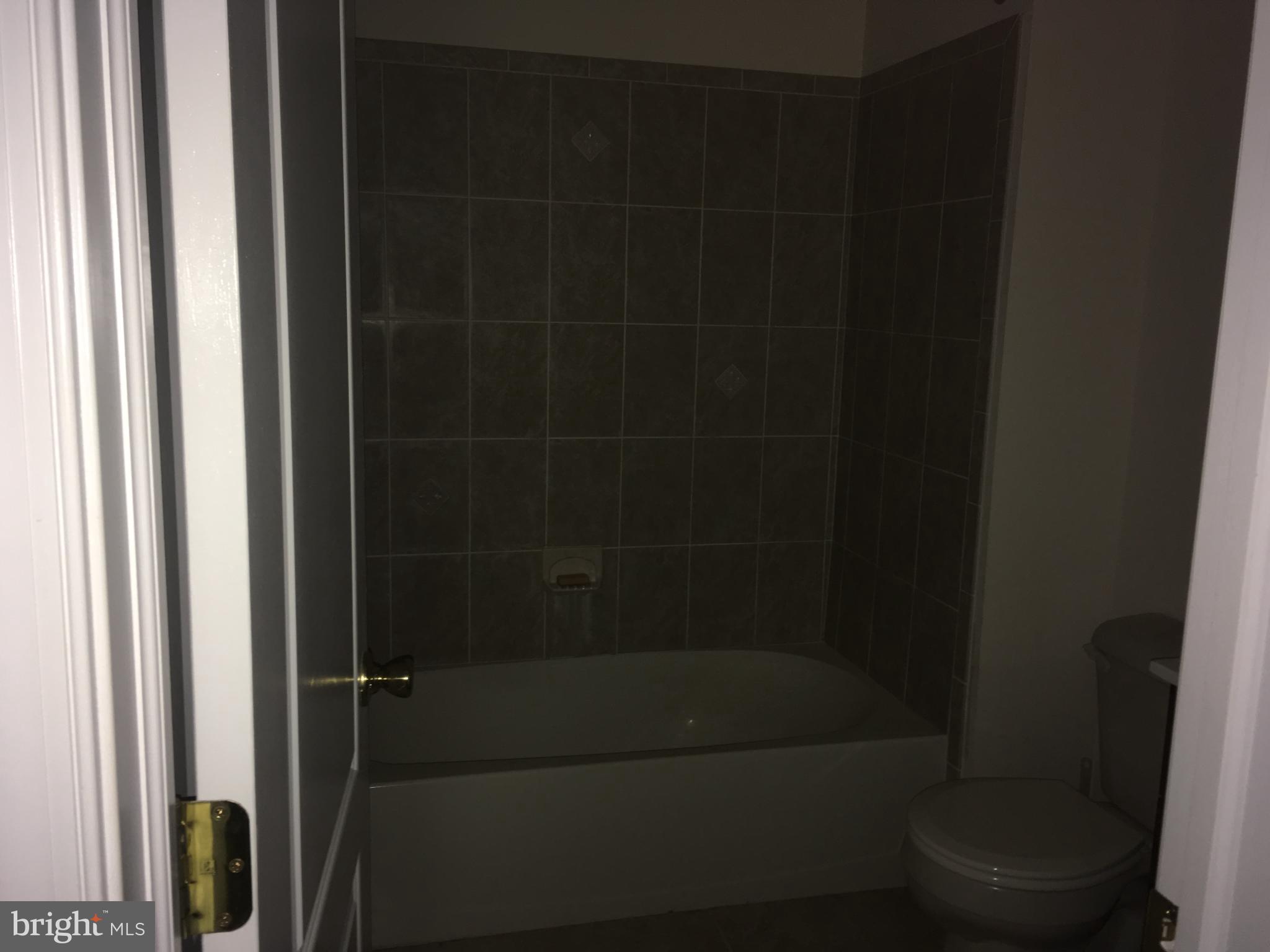 290 Byberry Road Philadelphia, PA 19116 - Photo 9 of 12 a bathroom with a shower and toilet