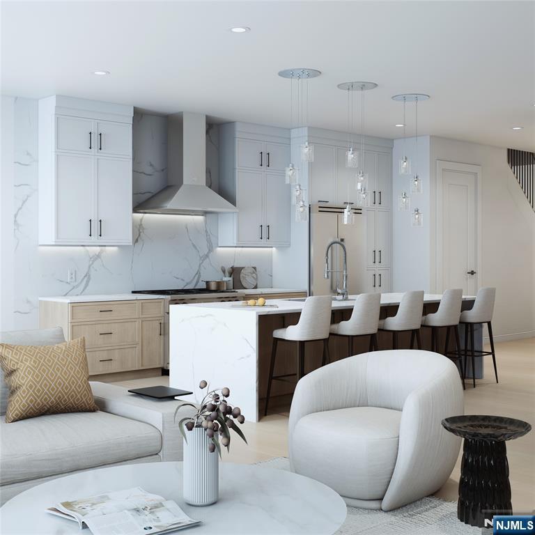 35 Feldman Court Paramus, NJ 07652 - Photo 4 of 24 a living room with furniture and white walls