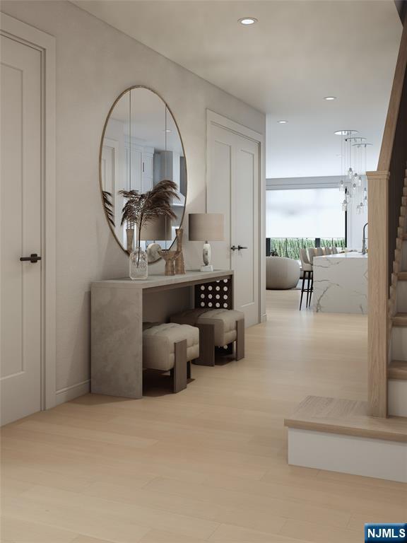 35 Feldman Court Paramus, NJ 07652 - Photo 10 of 24 a living room with furniture and a mirror