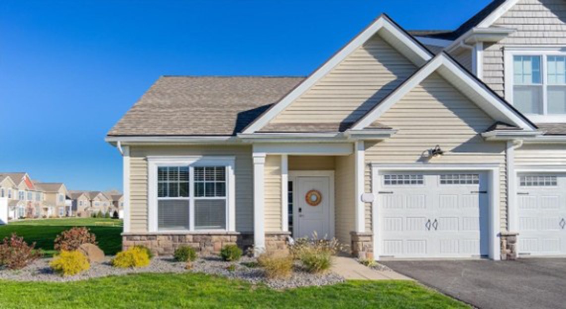 Typical exterior of a 2-bedroom ranch end-unit tow