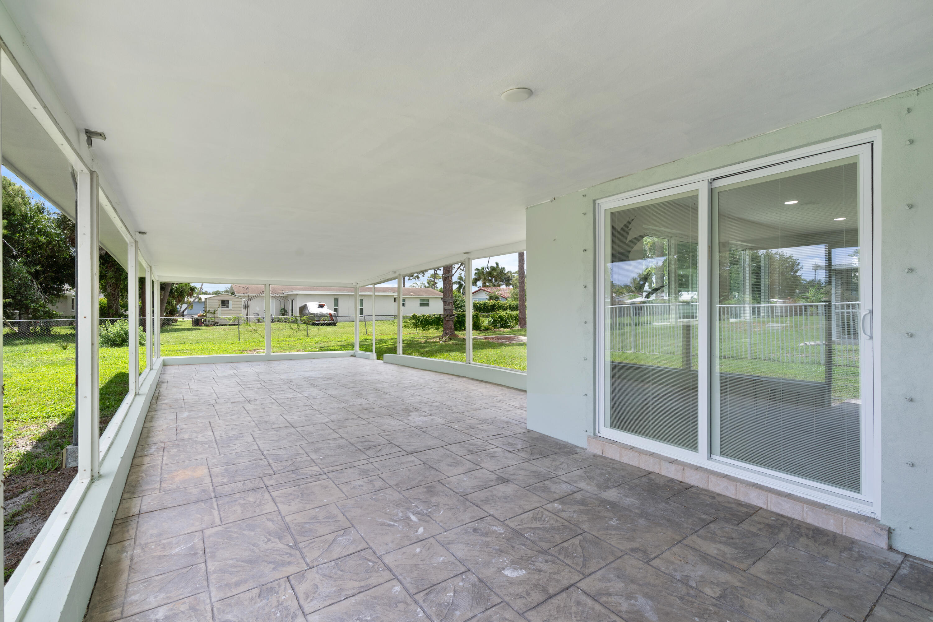 930 Rutherford Lane Haverhill, FL 33415 - Photo 23 of 25 a view of a garden with an outdoor seating