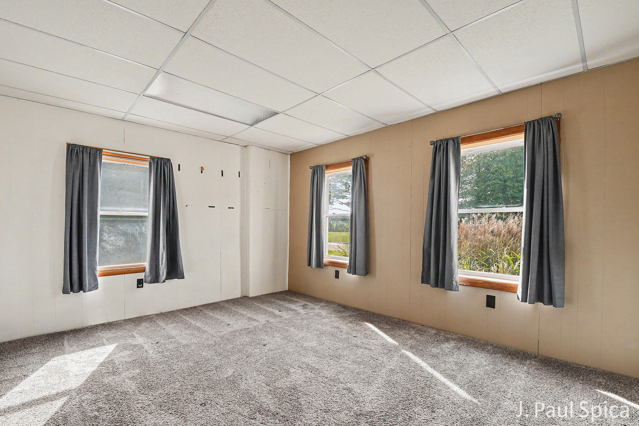 2235 17 Mile Road Kent City, MI 49330 - Photo 14 of 33 Main Floor Primary Bedroom