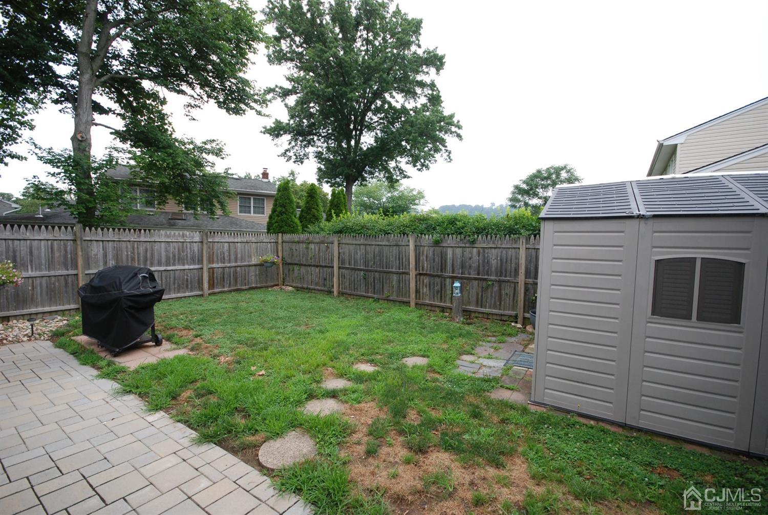 61 Greenbrook Road Middlesex, NJ 08846 - Photo 27 of 29 a view of a backyard with a garden