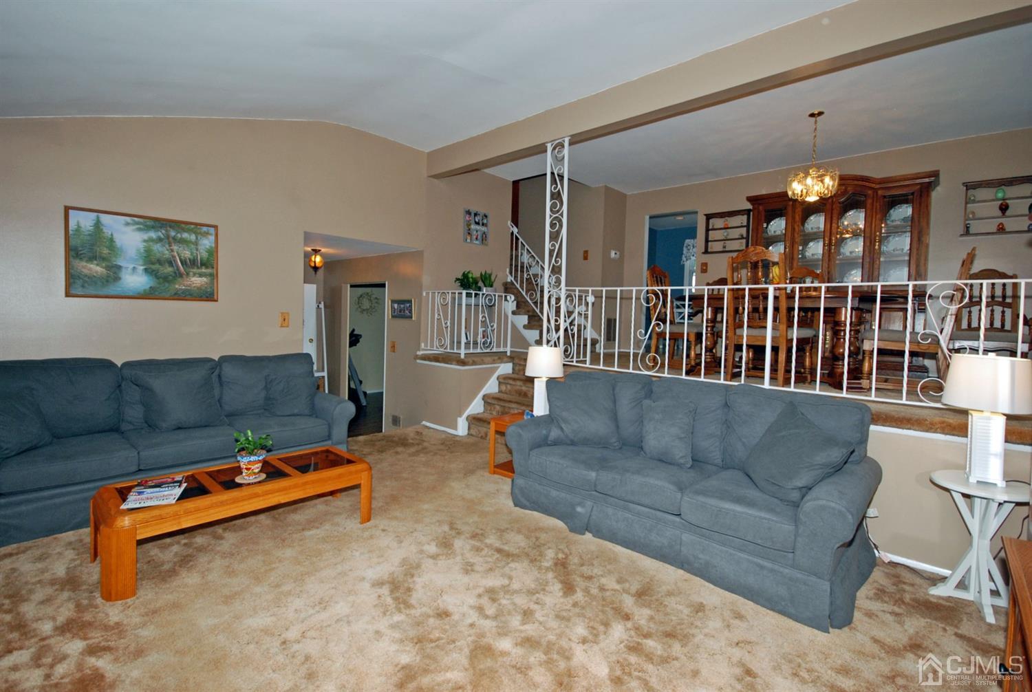 61 Greenbrook Road Middlesex, NJ 08846 - Photo 5 of 29 a living room with furniture and a couch