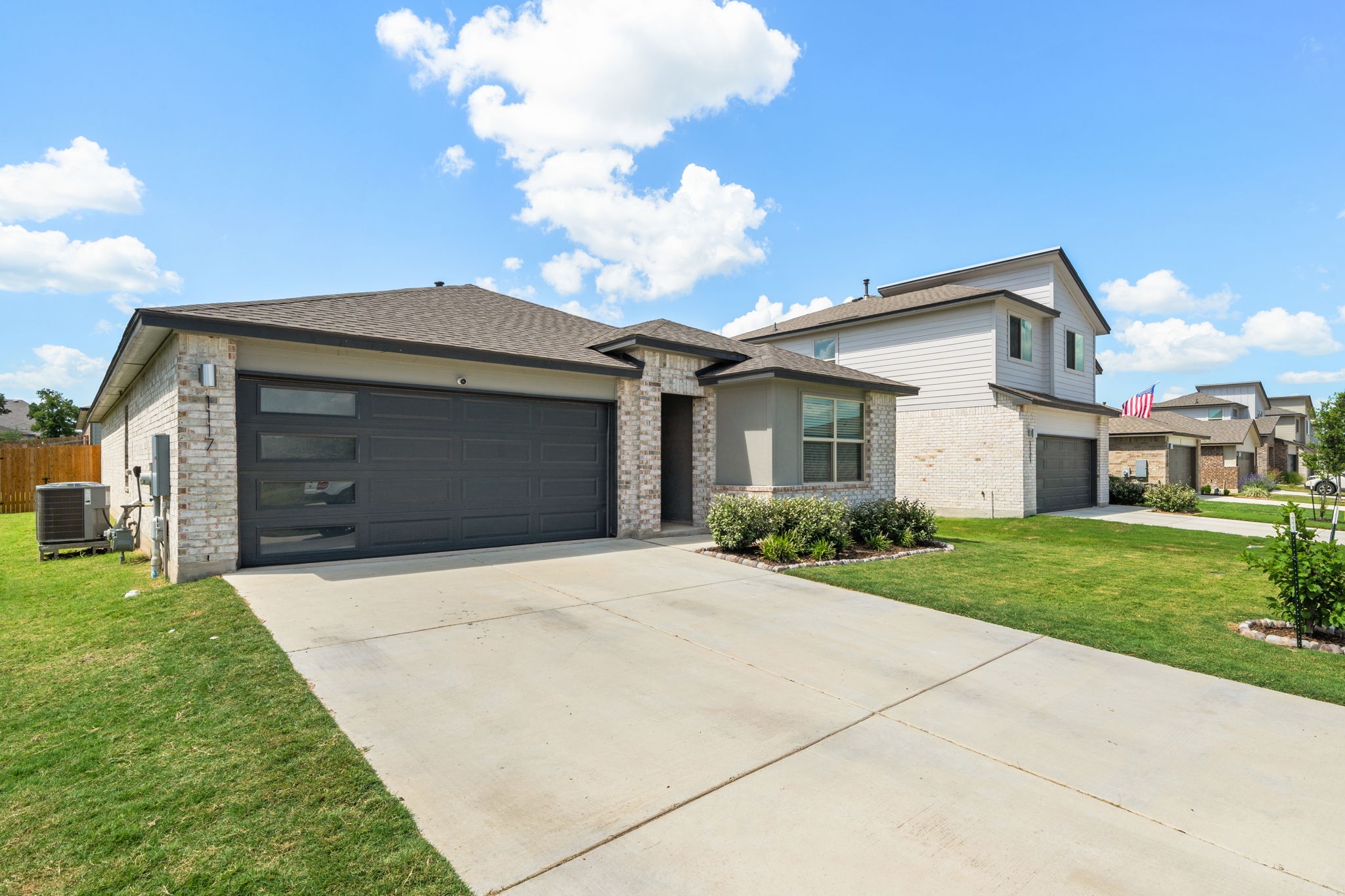 1117 Tipton Street Georgetown, TX 78633 - Photo 1 of 40 Contemporary exterior with light brick and grey siding accents
