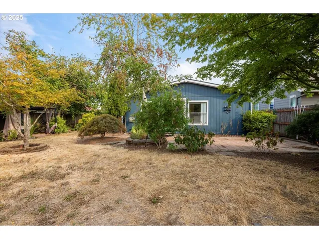 a view of a room with a wooden door