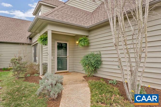 1134 Amber Ridge Road Charlottesville, VA 22901 - Photo 3 of 34 a view of brick house with potted plants