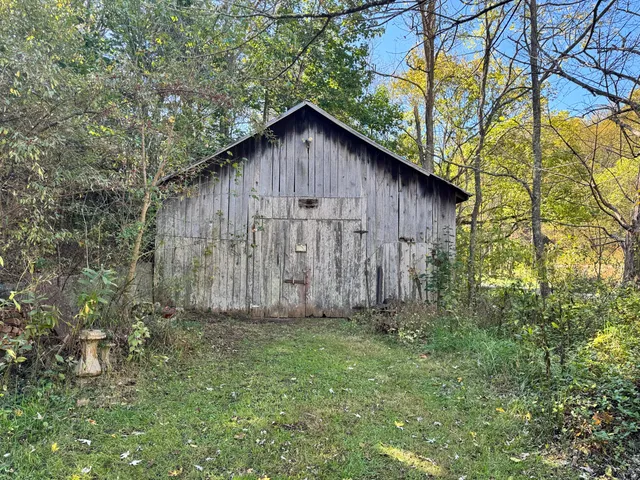 a wooden door in front of a house