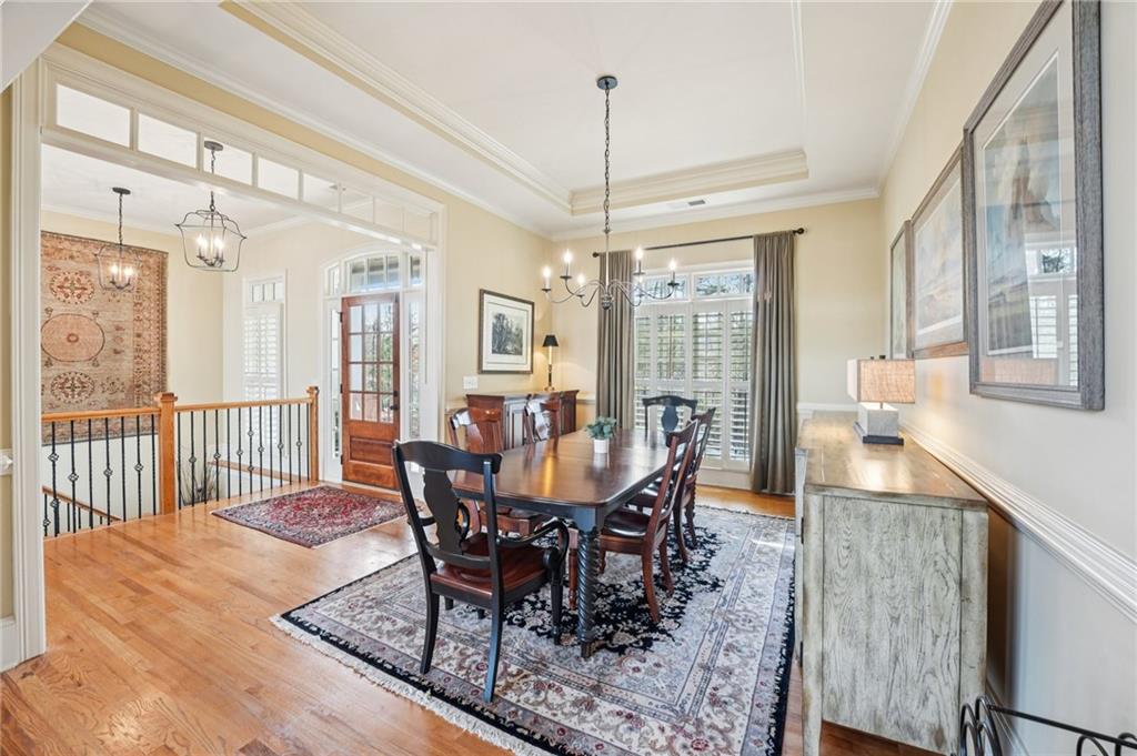 29 Red Trillium Ridge Big Canoe, GA 30143 - Photo 25 of 76 a view of a dining room with furniture window and wooden floor
