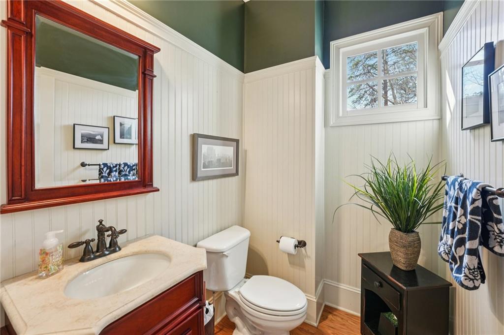 29 Red Trillium Ridge Big Canoe, GA 30143 - Photo 27 of 76 a bathroom with a toilet sink and mirror