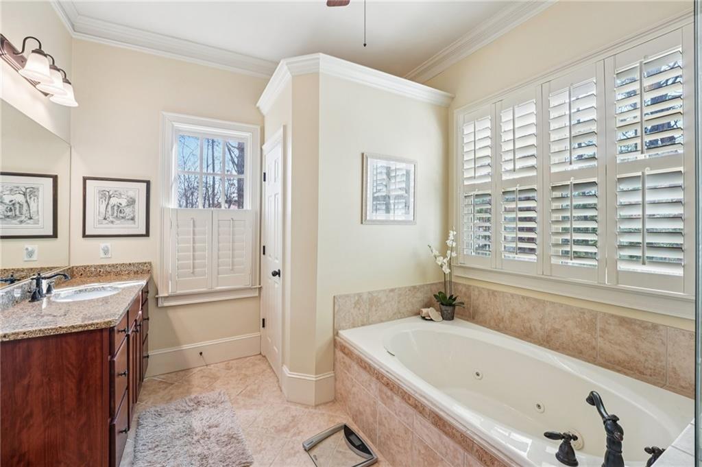 29 Red Trillium Ridge Big Canoe, GA 30143 - Photo 34 of 76 a bathroom with a bathtub and a sink