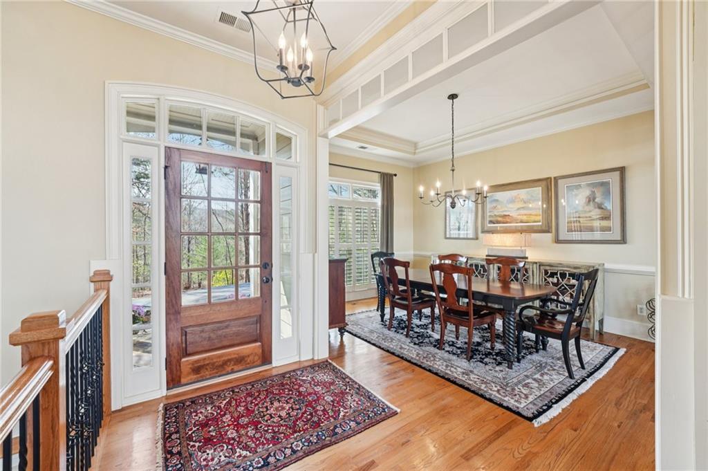 29 Red Trillium Ridge Big Canoe, GA 30143 - Photo 5 of 76 a view of a dining room with furniture window and wooden floor