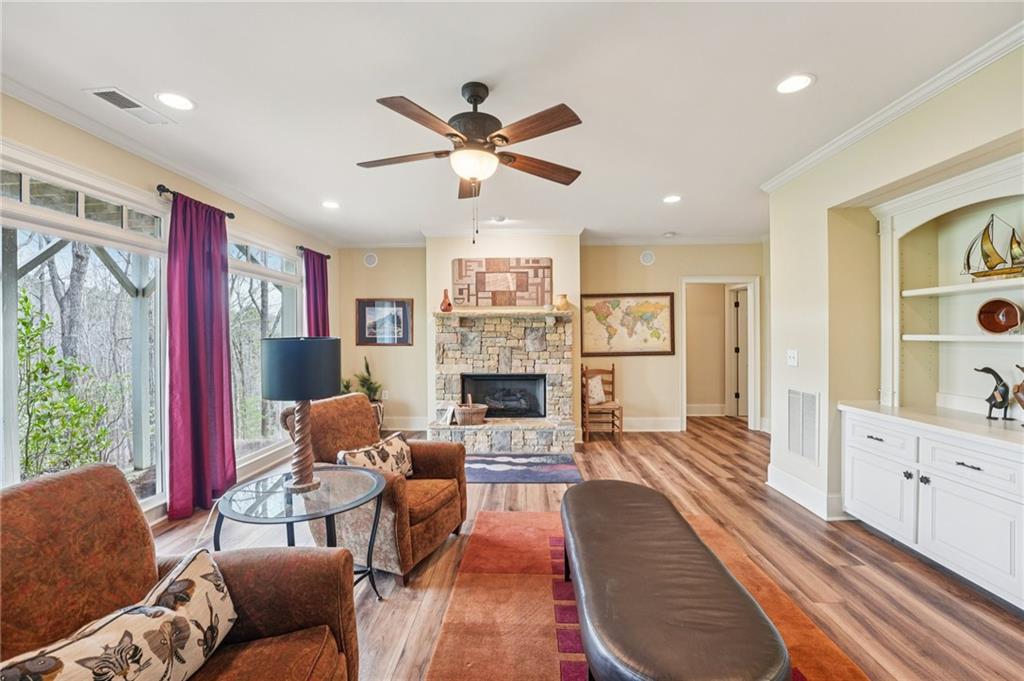 29 Red Trillium Ridge Big Canoe, GA 30143 - Photo 51 of 76 a living room with furniture and a fireplace
