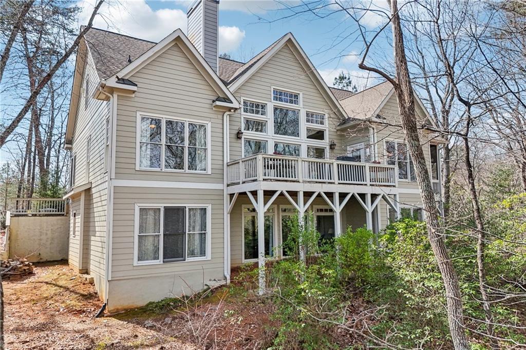 29 Red Trillium Ridge Big Canoe, GA 30143 - Photo 71 of 76 a front view of a house with a yard