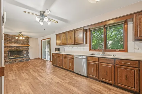 a room with a desk and a window