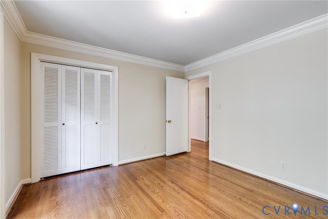 10475 Cherokee Road Richmond, VA 23235 - Photo 31 of 74 Hardwood flooring, crown molding, white louvered b