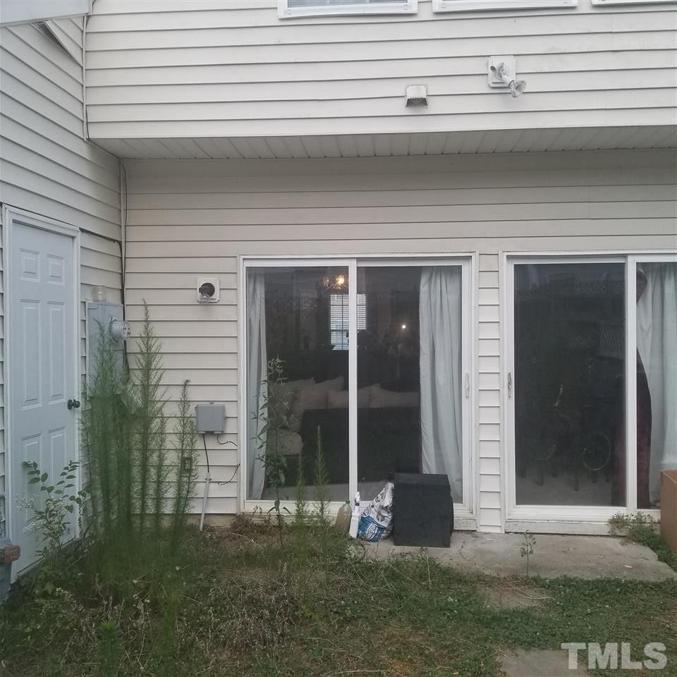 5330 Glen Canyon Road Raleigh, NC 27616 - Photo 14 of 15 a front view of a house with a garden
