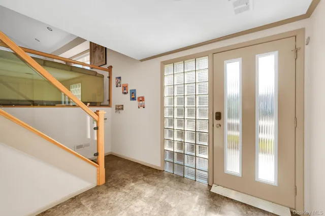 a view of a room with stairs