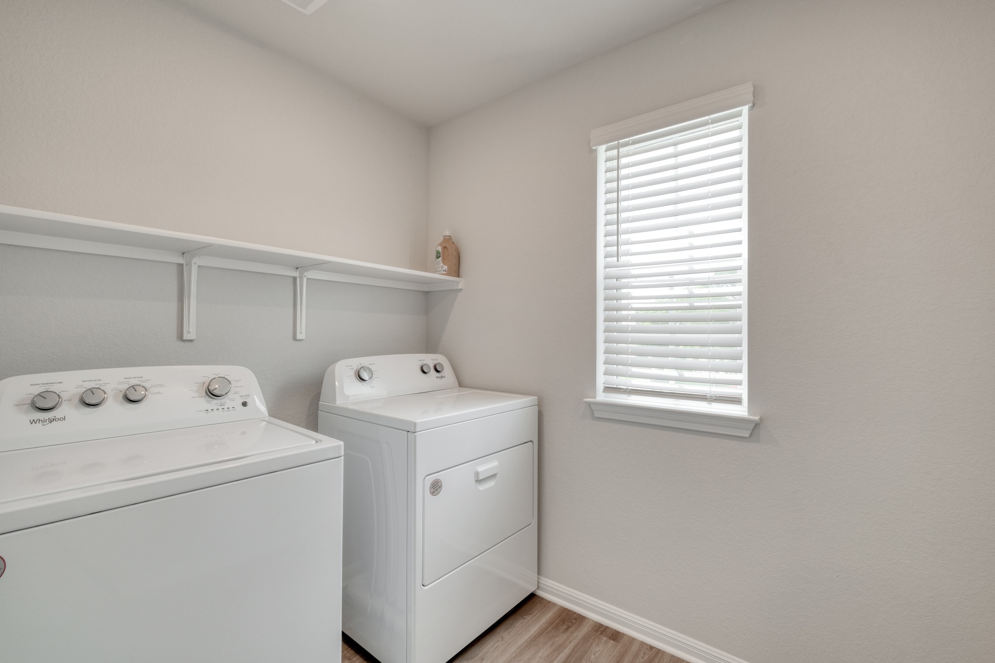 128 Checkers Cove Elgin, TX 78621 - Photo 18 of 19 Laundry Room Upstairs