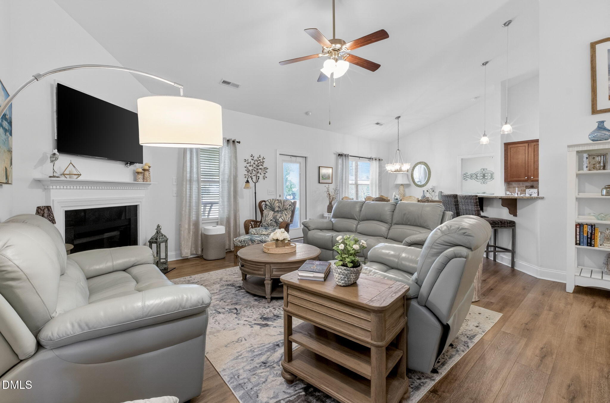20 Deep Clay Circle Angier, NC 27501 - Photo 14 of 54 a living room with furniture fireplace and a flat screen tv