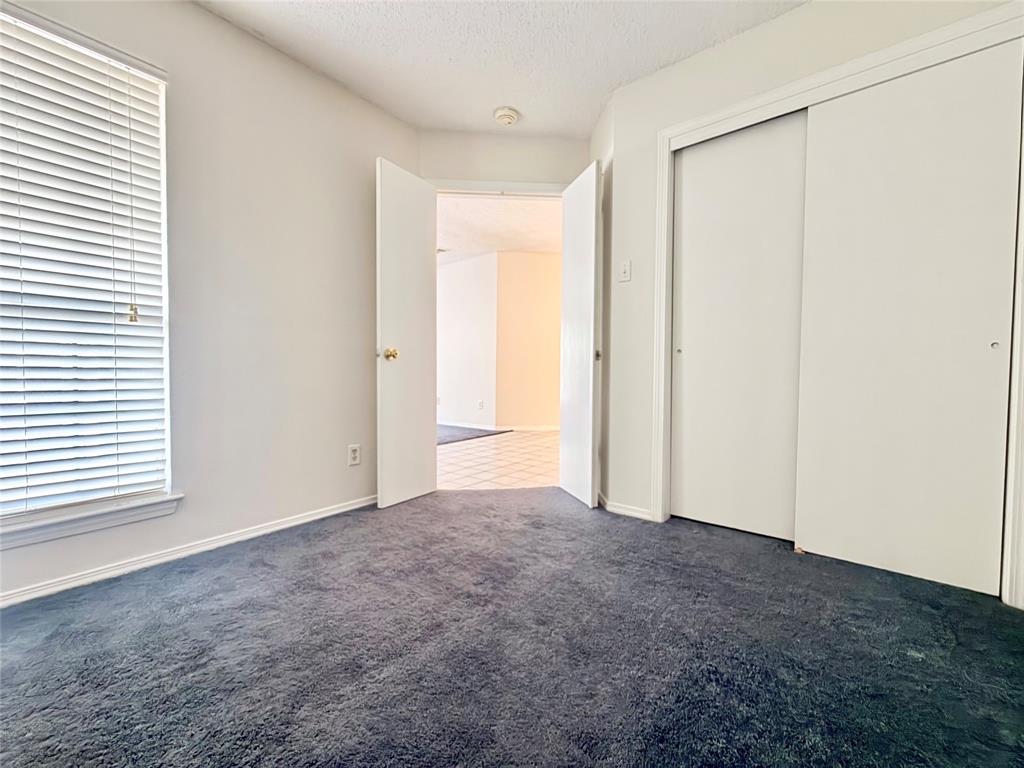 18333 Roehampton Drive, Unit 624 Dallas, TX 75252 - Photo 14 of 39 a view of an empty room