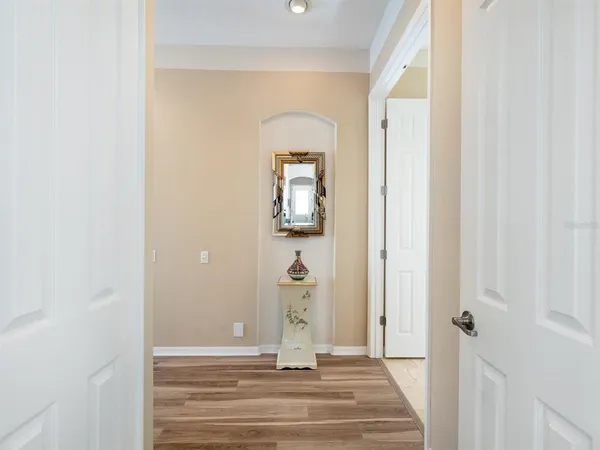 an aerial view of a residential houses with outdoor space and river
