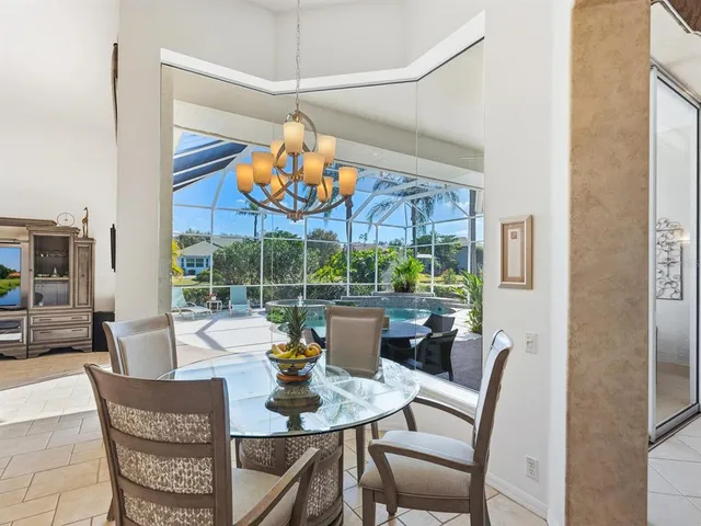 a view of a house with backyard and porch