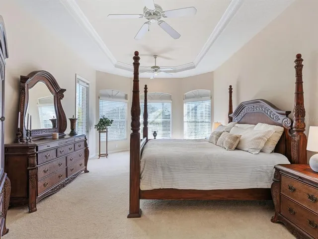 a view of a lake with houses in the back