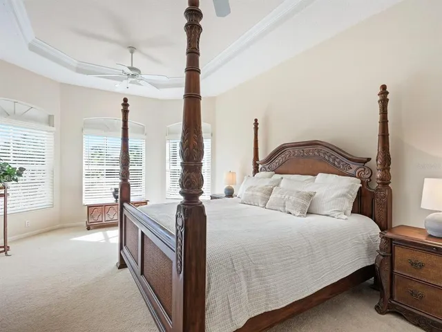 a view of swimming pool with outdoor seating and yard in back