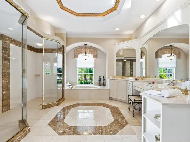 a front view of a house with a garden and plants