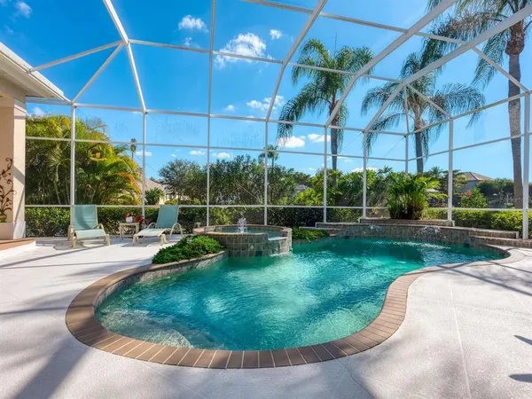 wooden chairs and tables on a patio
