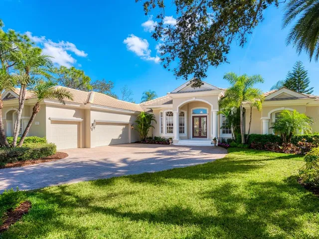 a view of a livingroom with furniture window and front door