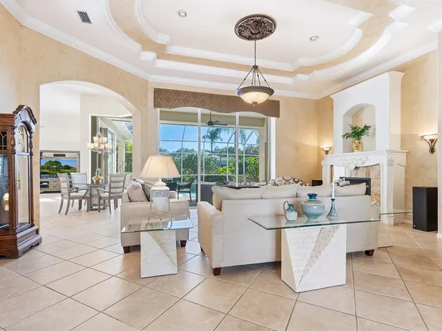 a view of a dining room with furniture window and outside view