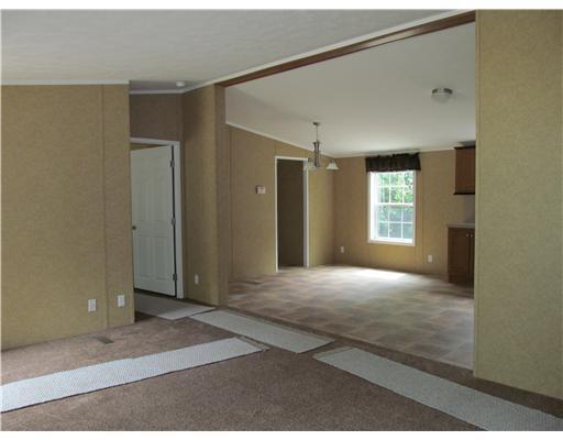 84 Lower Cross Road Lebanon, ME 04027 - Photo 7 of 14 Living Room. Living room through to...