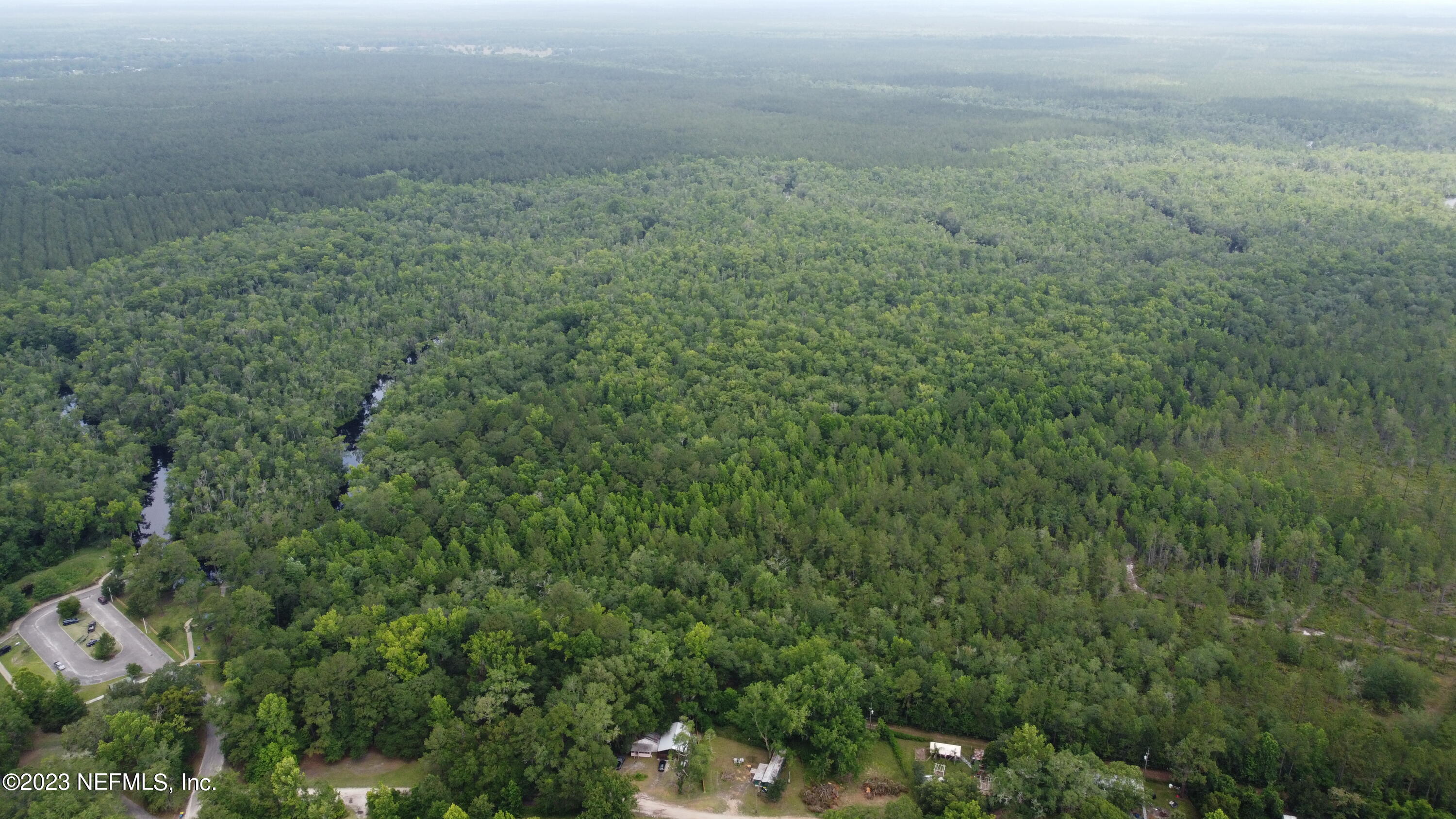 0 Ethel Road Jacksonville, FL 32218 - Photo 11 of 24 a view of a field of grass and trees