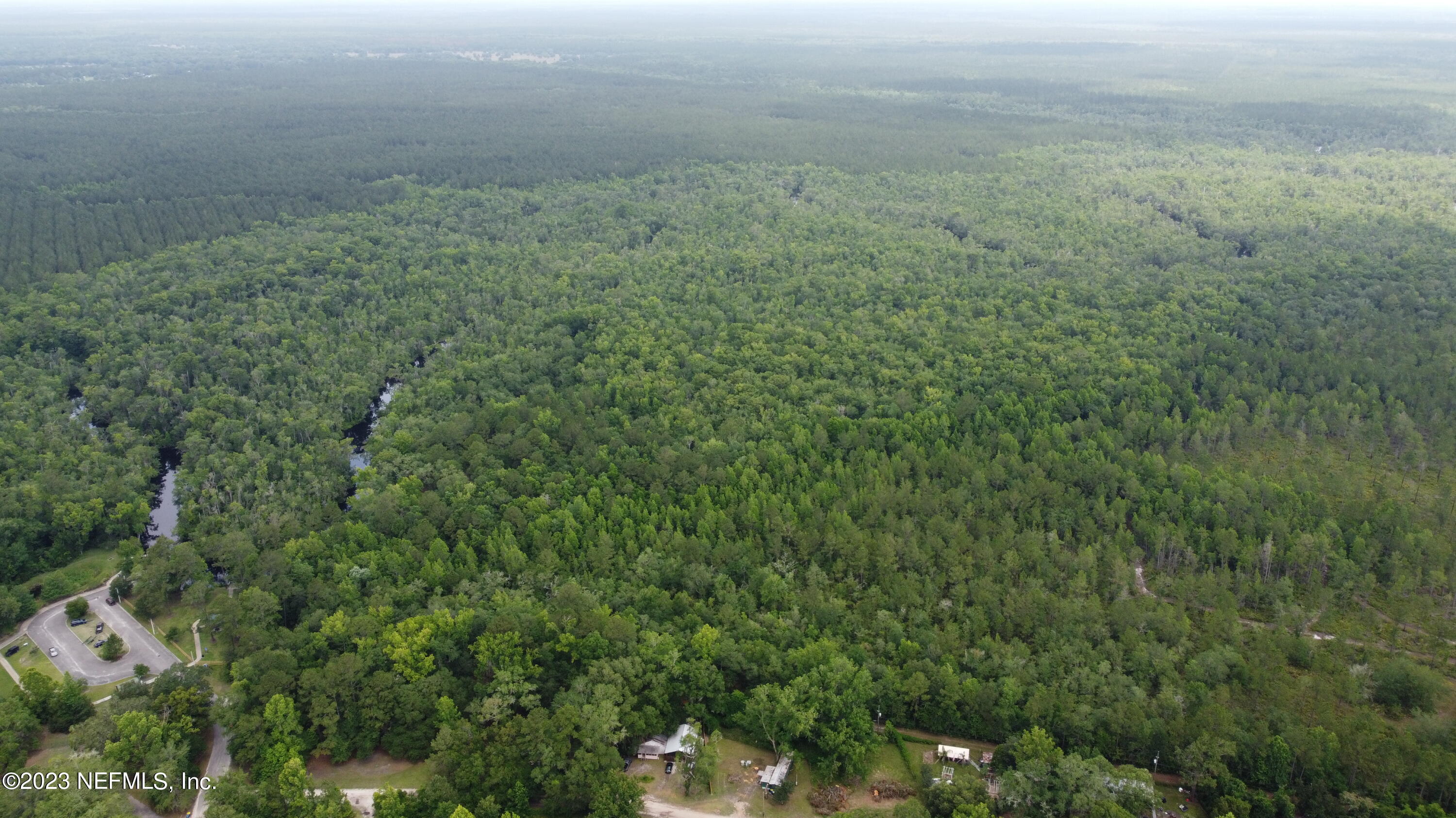 0 Ethel Road Jacksonville, FL 32218 - Photo 10 of 24 a view of a field of grass and trees