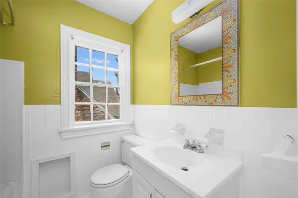 a bathroom with a sink and a toilet