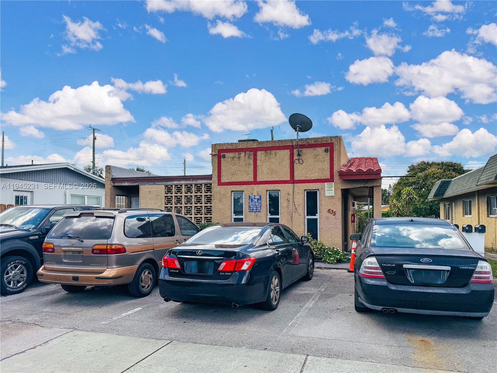 a car parked in front of a house