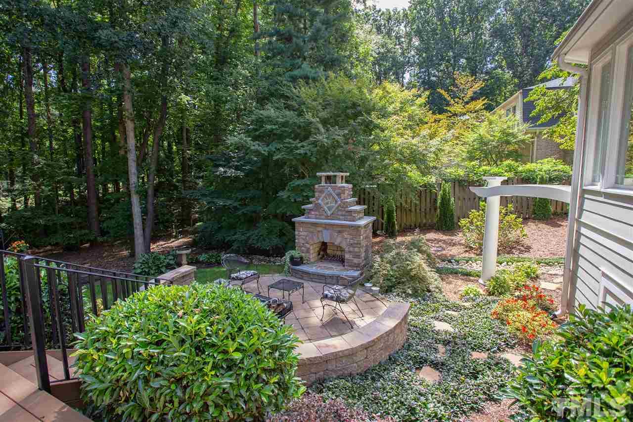 123 Bruce Drive Cary, NC 27511 - Photo 28 of 30 a view of a chair and table in backyard