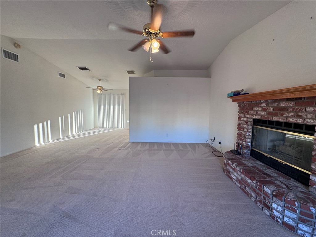 400 Vista Street Ridgecrest, CA 93555 - Photo 11 of 32 a view of an empty room with a fireplace