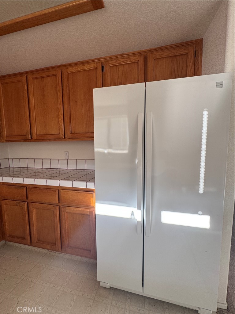 400 Vista Street Ridgecrest, CA 93555 - Photo 17 of 32 a bathroom with a shower