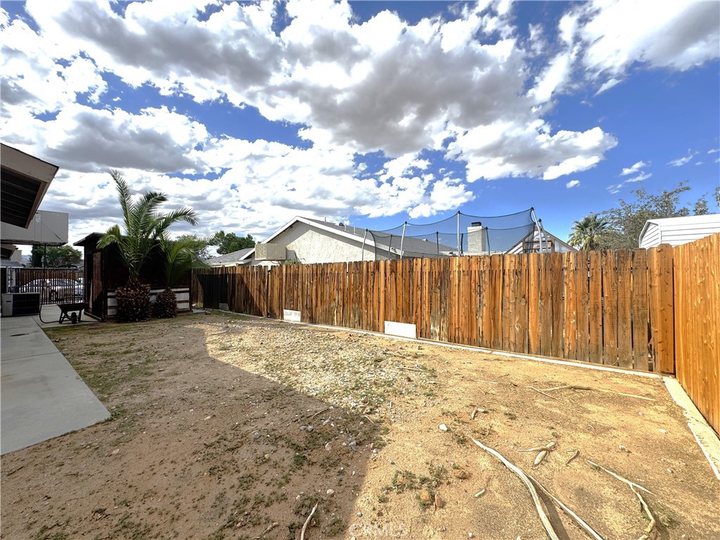 400 Vista Street Ridgecrest, CA 93555 - Photo 6 of 32 a view of a backyard of the house